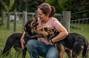 Olivia Weatherburn and two dogs